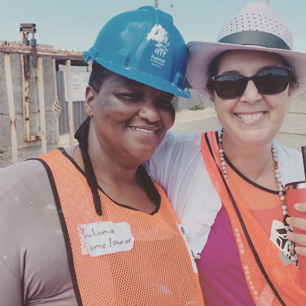 Dana Smirin with Lulama Goma at the Habitat for Humanity build
