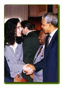 Dana Smirin shaking hands with Nelson Mandela