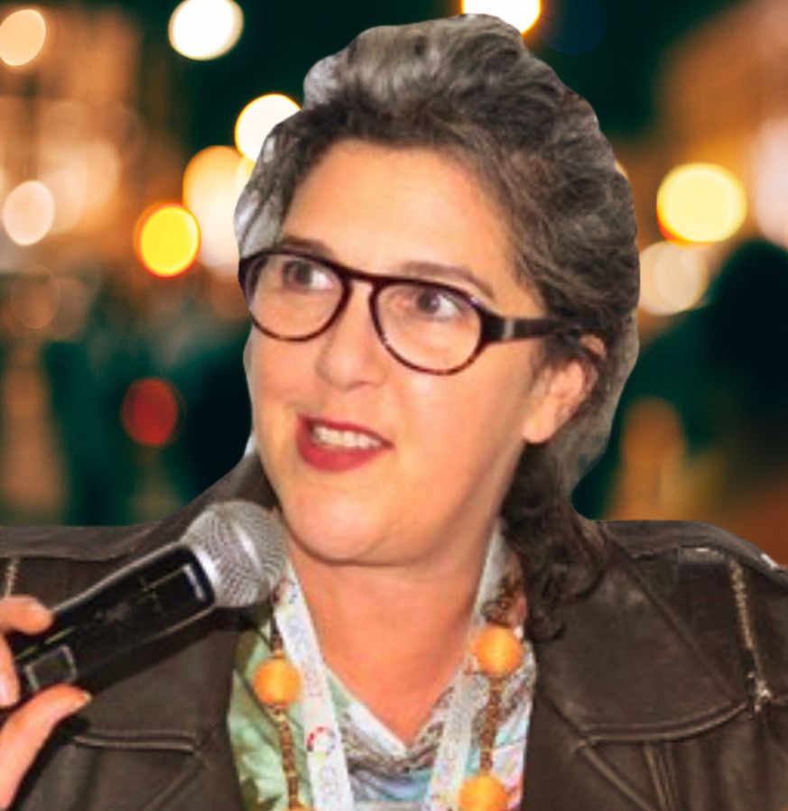 Dana Smirin speaking with a microphone